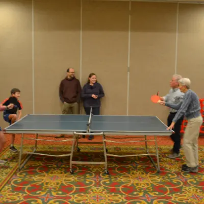 Drs. Youth and Talbot taking on the kids in ping pong!