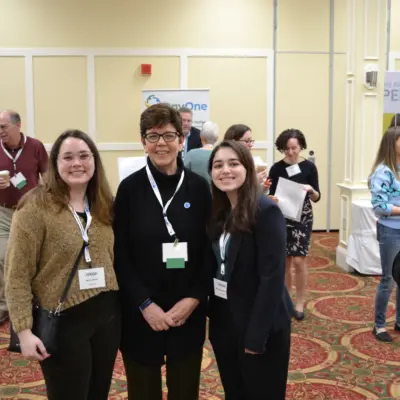 Dr. Carmack with two of the UNE students