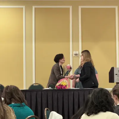 Julia Oppenheimer receiving Pelletier award